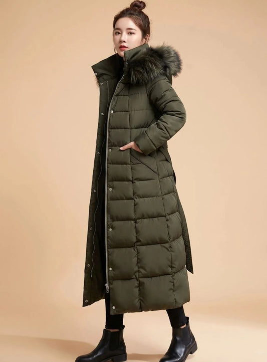 Emilia long quilted winter coat with faux fur trimmed hood in army green, front view on model