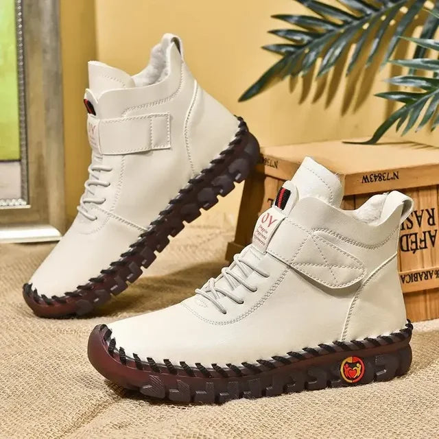 White lace-up mid-top ankle boots, pair view