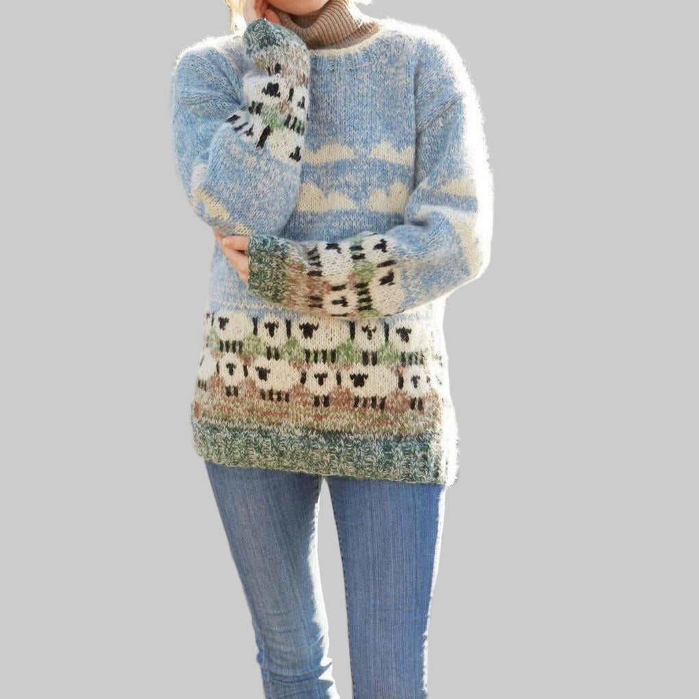 Sheep motif knit sweater with ribbed cuffs, detail view