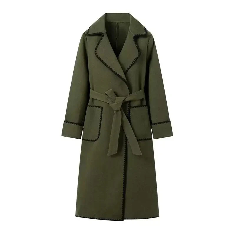 Woman wearing Kendall trench coat in green, full front view