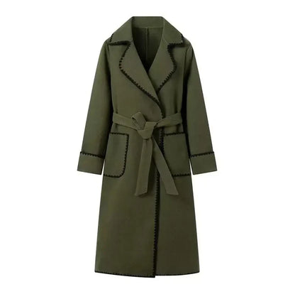 Woman wearing Kendall trench coat in green, full front view