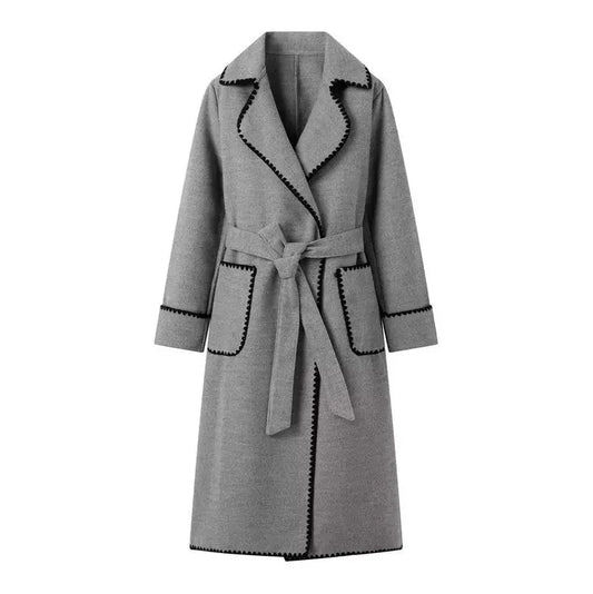 Woman wearing Kendall trench coat in grey, front view