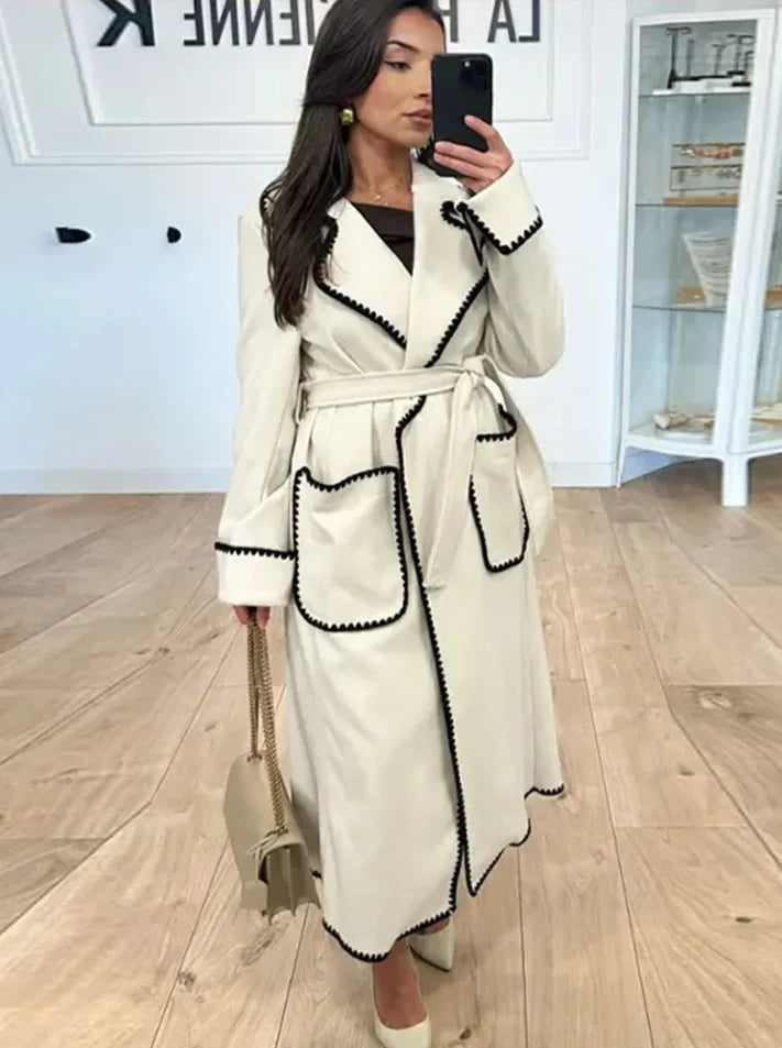 Woman wearing Kendall trench coat in white, front view, close crop