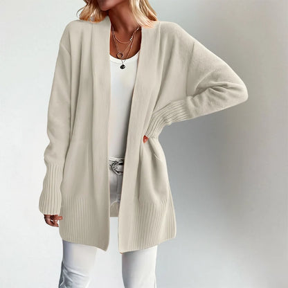 Woman wearing Talia cardigan in white, front view