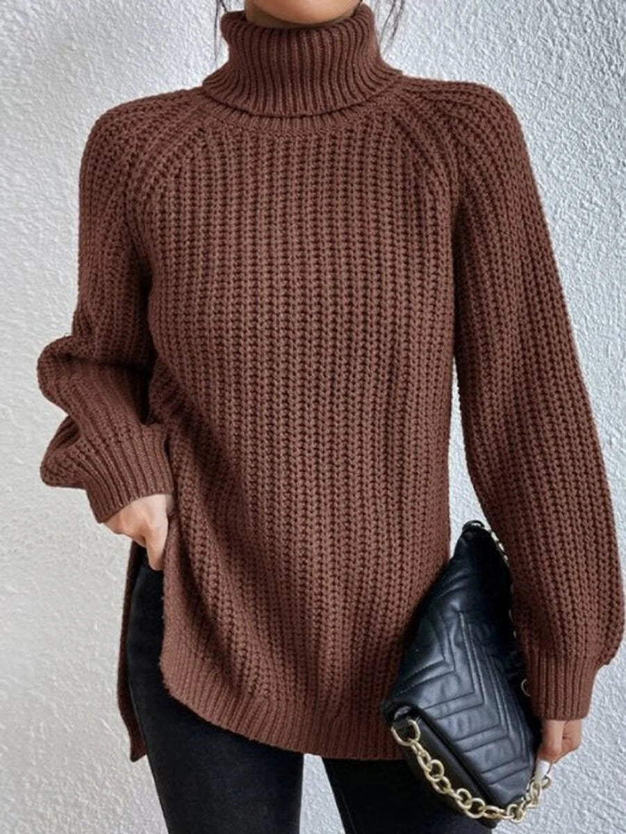 Amelie oversized chunky knit turtleneck sweater in amber, front view on model
