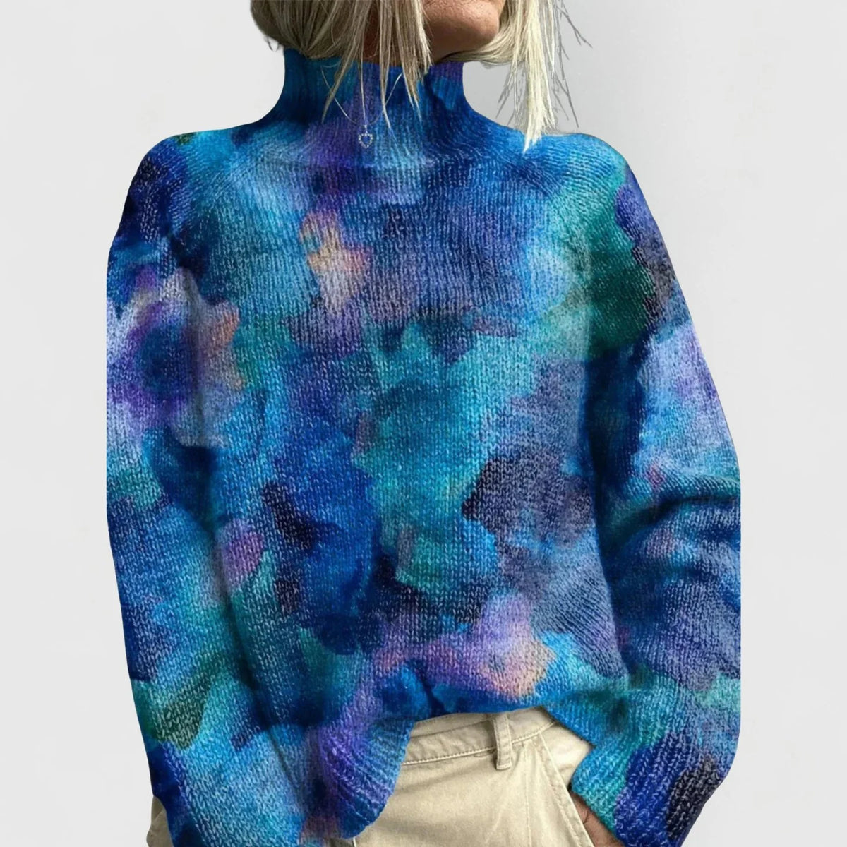 Annika relaxed fit knit turtleneck sweater in blue, front view on model