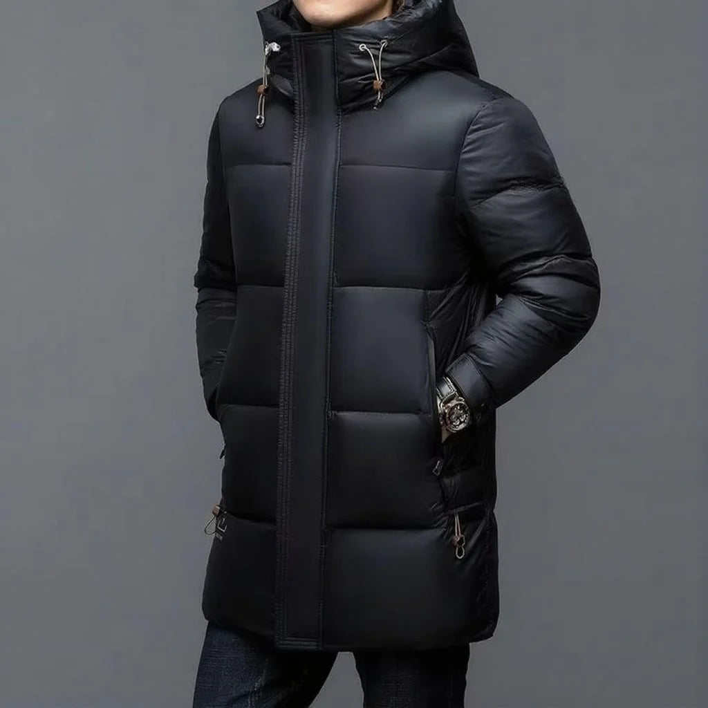 ArcticShield men's hooded down parka in black, front view on model with hood