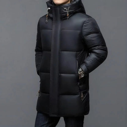 ArcticShield men's hooded down parka in black, front view on model with hood