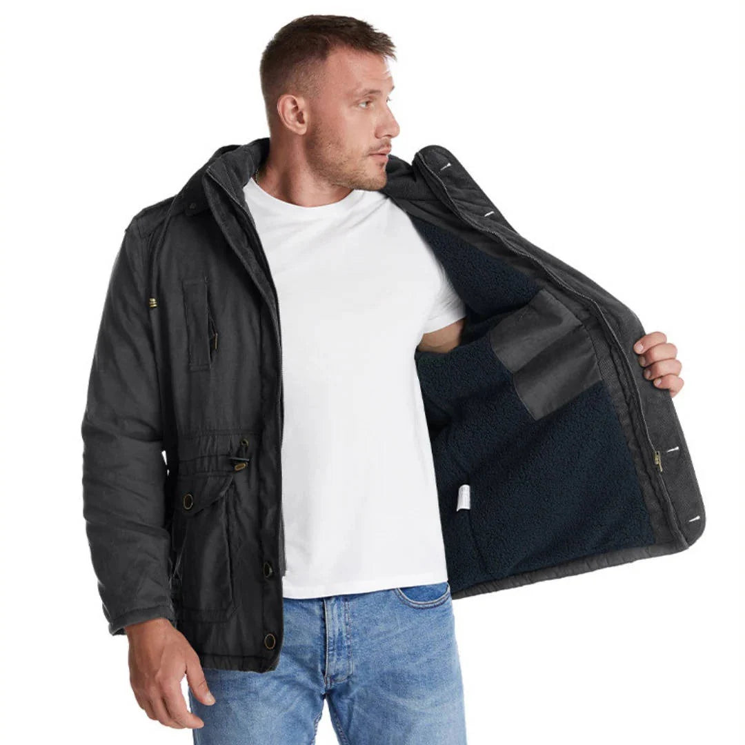 ArcticShield men's sherpa lined winter parka in black, open front on model showing the sherpa lining