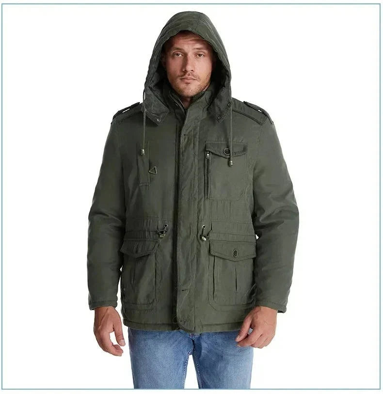 ArcticShield men's sherpa lined winter parka in olive, front view on model with hood up