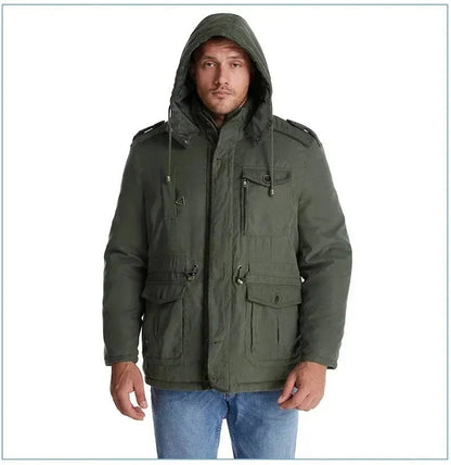 ArcticShield men's sherpa lined winter parka in olive, front view on model with hood up