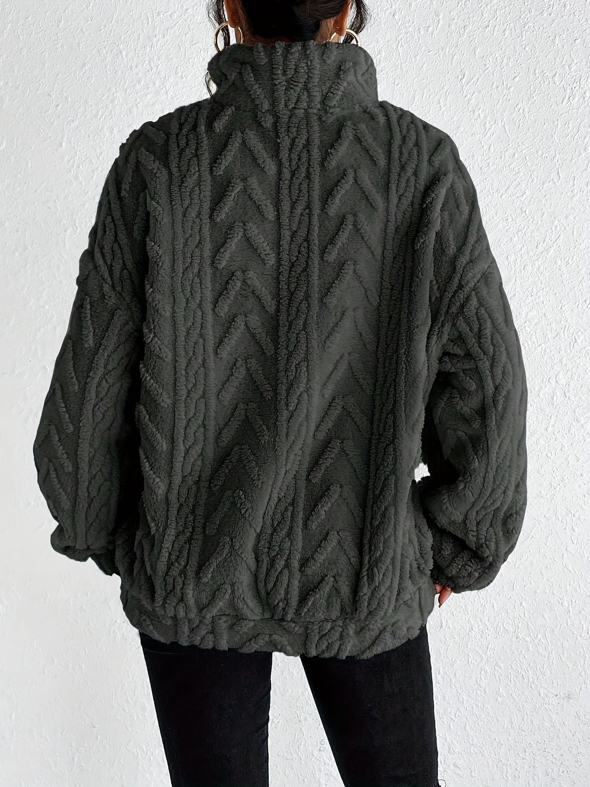 Women's cable-knit zip-neck sweater in dark grey, back view