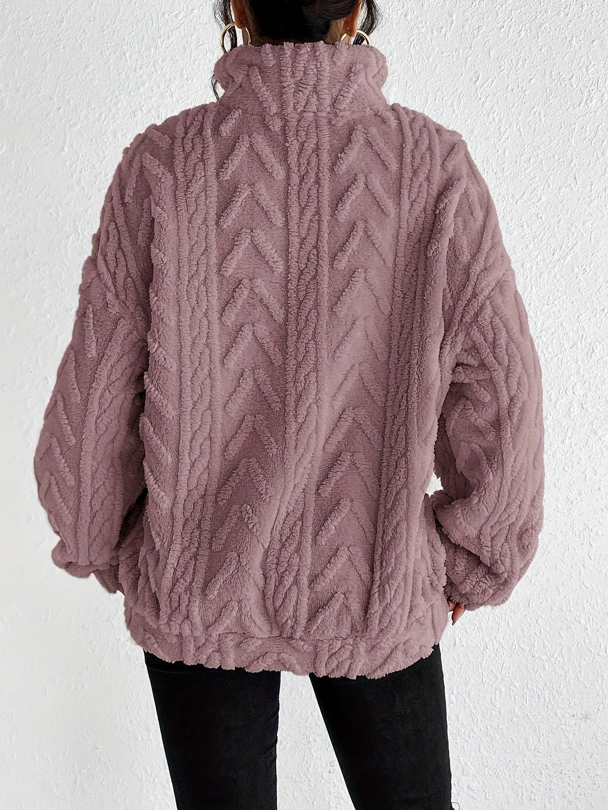 Women's cable-knit zip-neck sweater in light purple, back view
