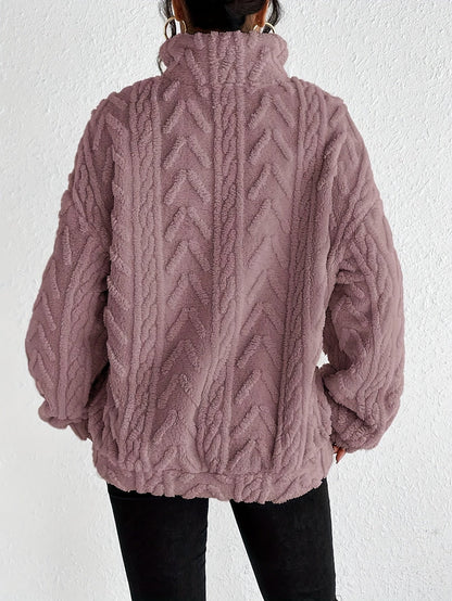 Women's cable-knit zip-neck sweater in light purple, back view