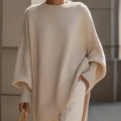 Women's oversized poncho sweater with batwing sleeves in Beige