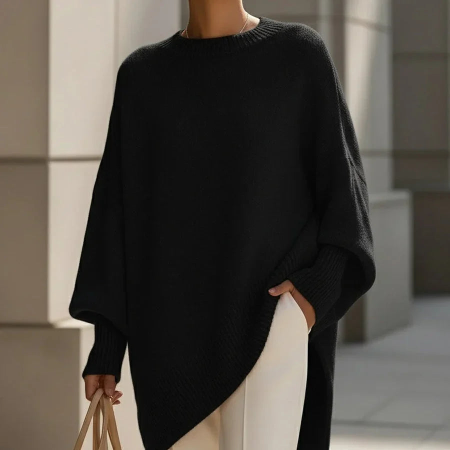 Women's oversized poncho sweater with batwing sleeves in Black