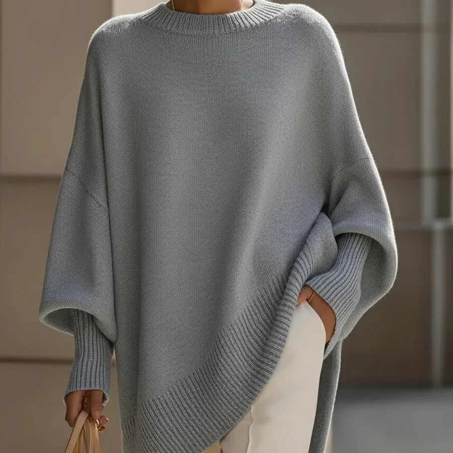 Women's oversized poncho sweater with batwing sleeves in Grey
