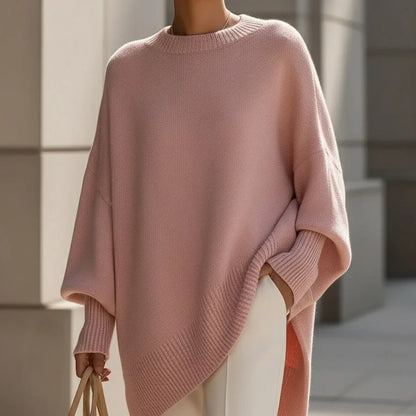 Women's oversized poncho sweater with batwing sleeves in Pink