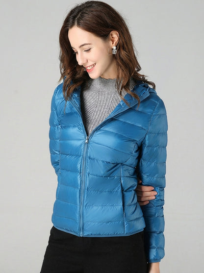Women's lightweight down puffer jacket with hood in blue