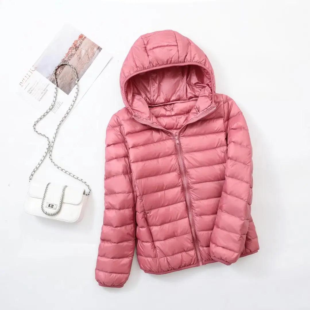 Women's lightweight down puffer jacket with hood in light pink