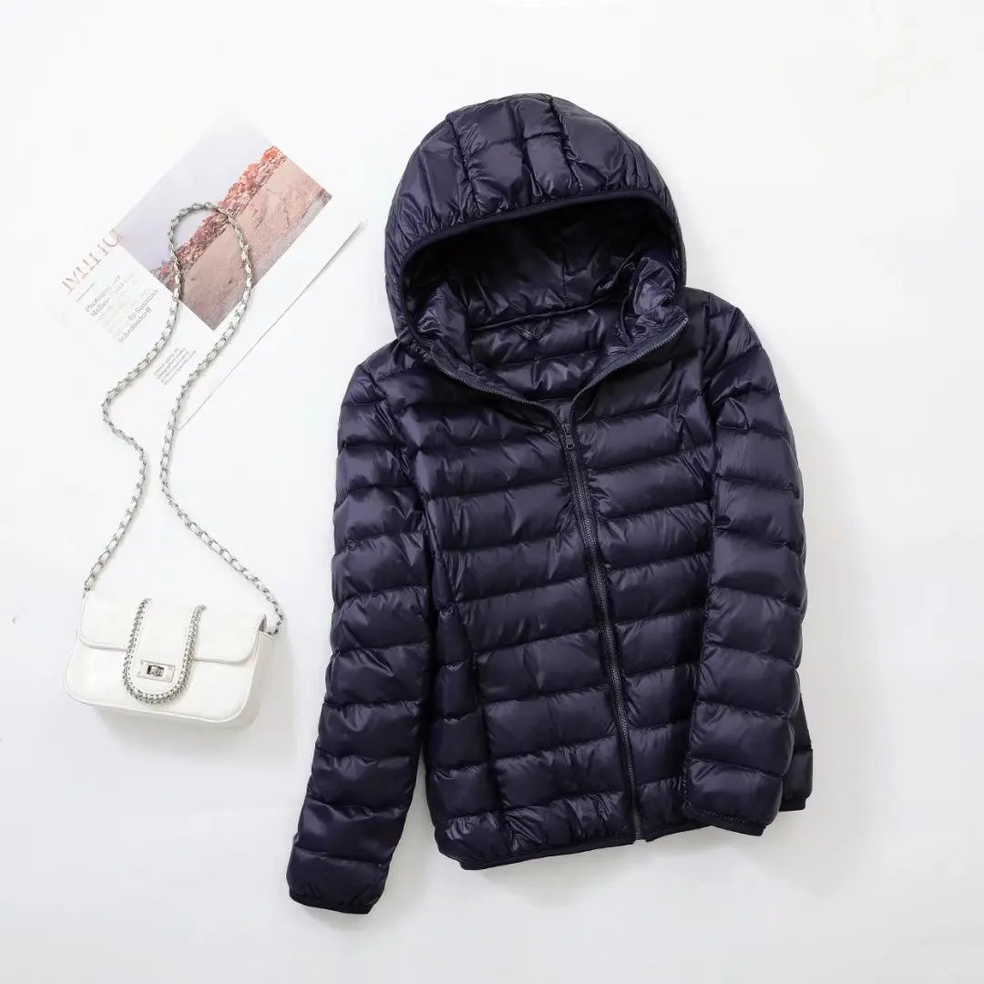 Women's lightweight down puffer jacket with hood in navy