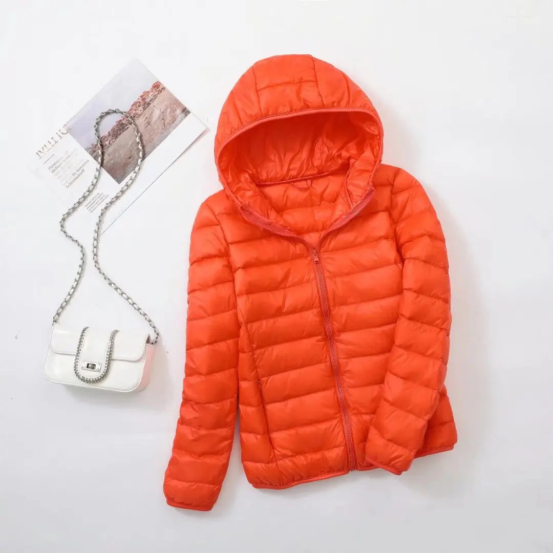 Women's lightweight down puffer jacket with hood in orange