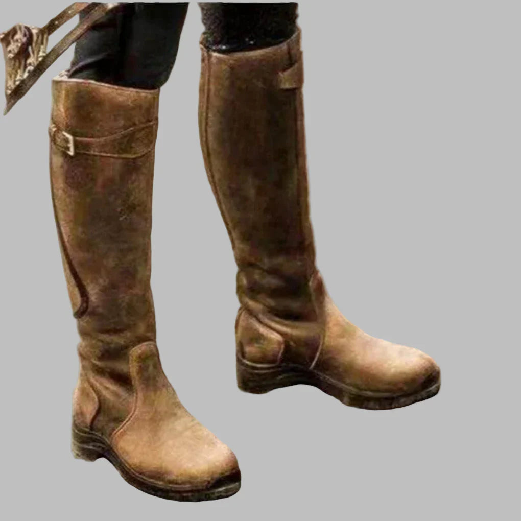 Greta leather orthopedic boots in brown, side view on model