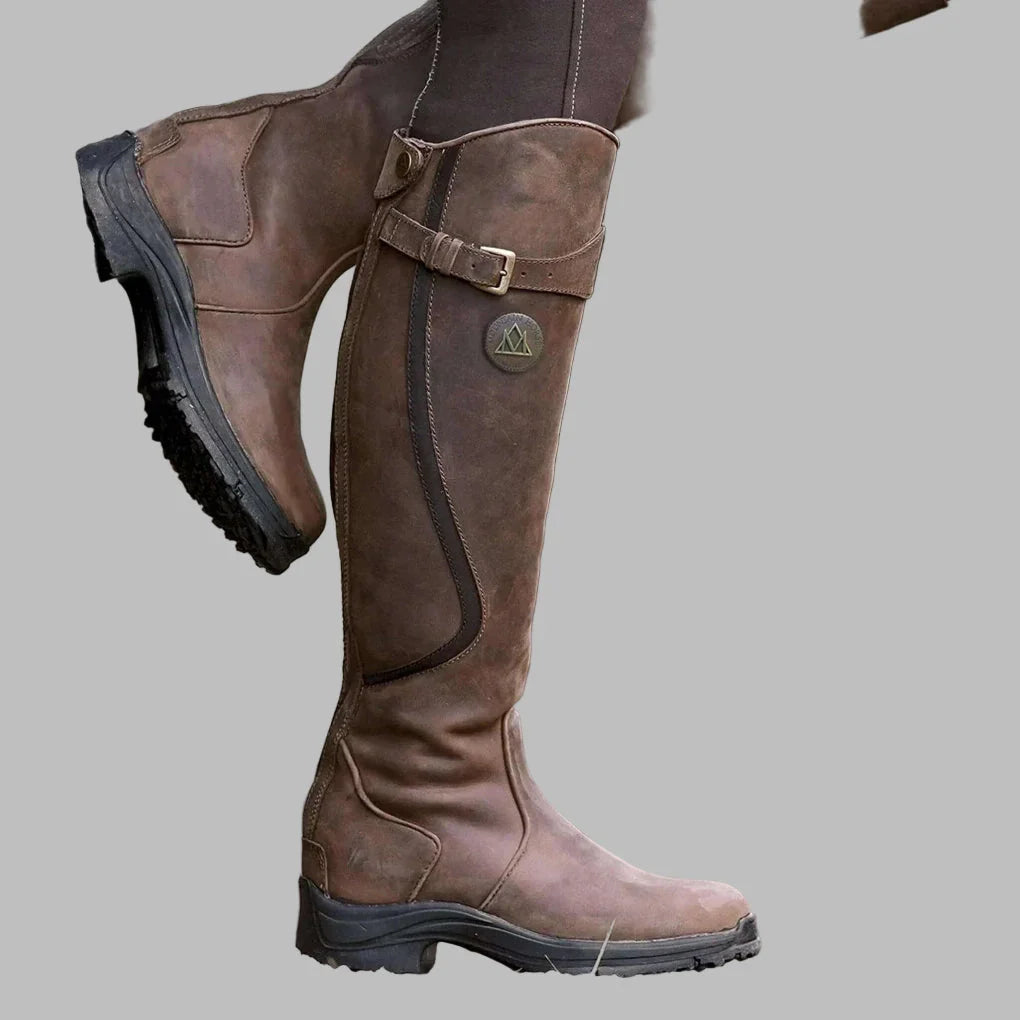 Greta leather orthopedic boots in dark brown, side view on model