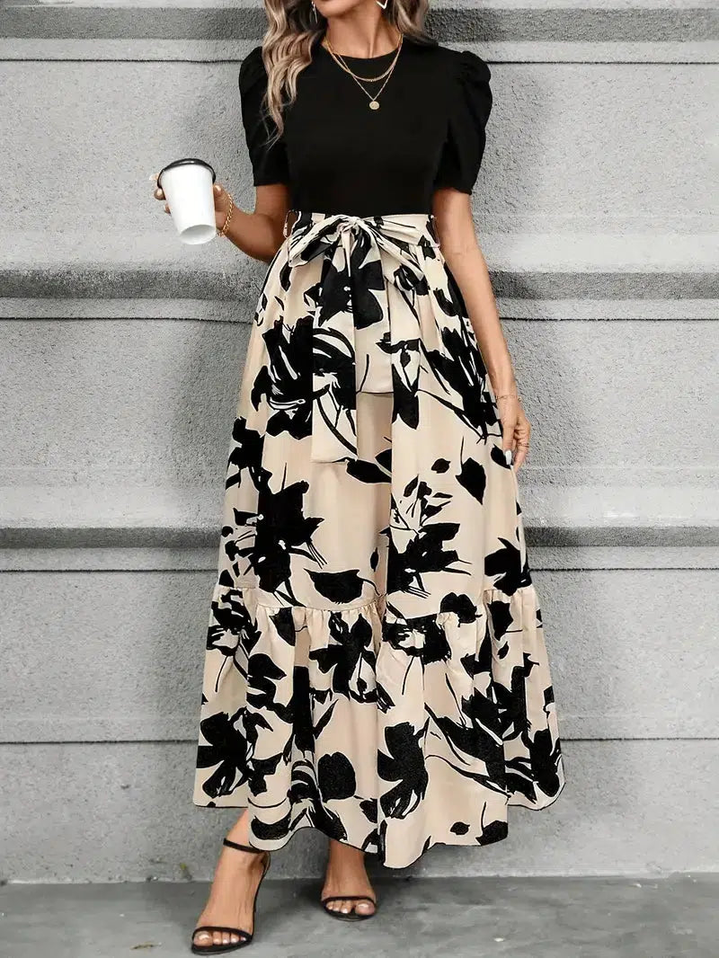 Hannah floral maxi dress in floral beige noir print, walking view