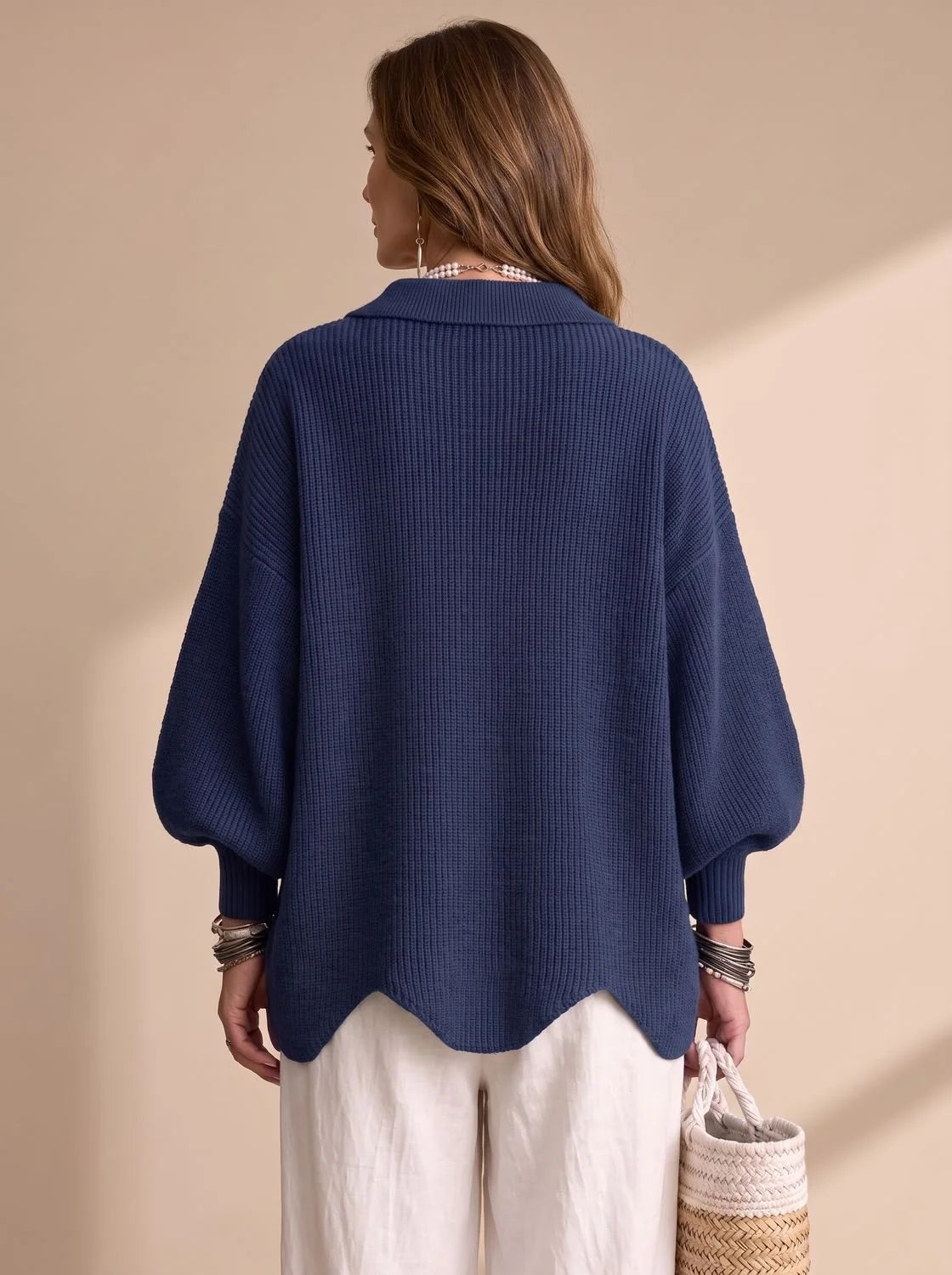 Victoria oversized knit cardigan in navy blue, back view on model