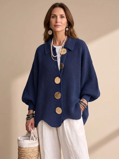 Victoria oversized knit cardigan in navy blue, front view on model