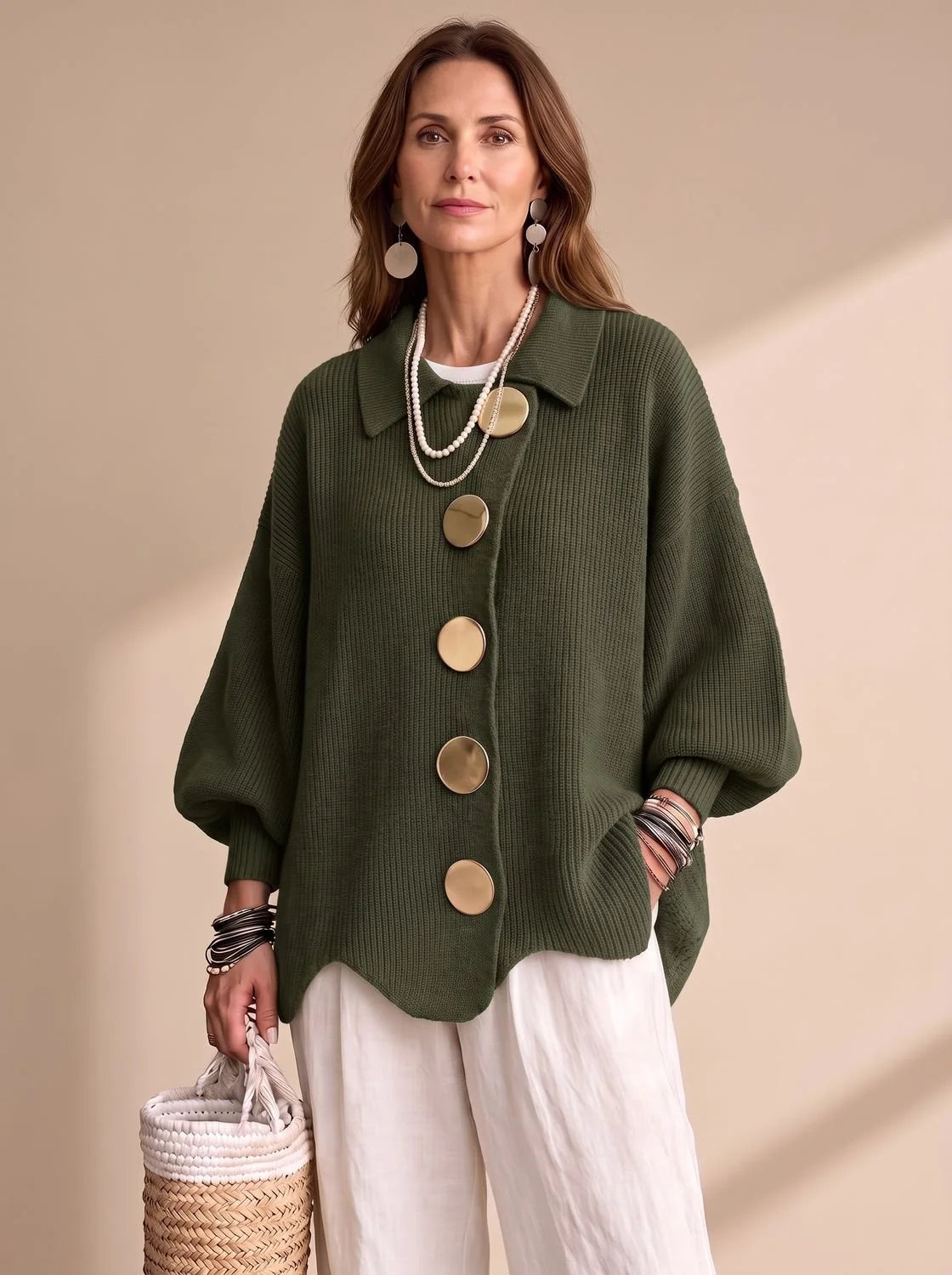 Victoria oversized knit cardigan in olive green, front view on model
