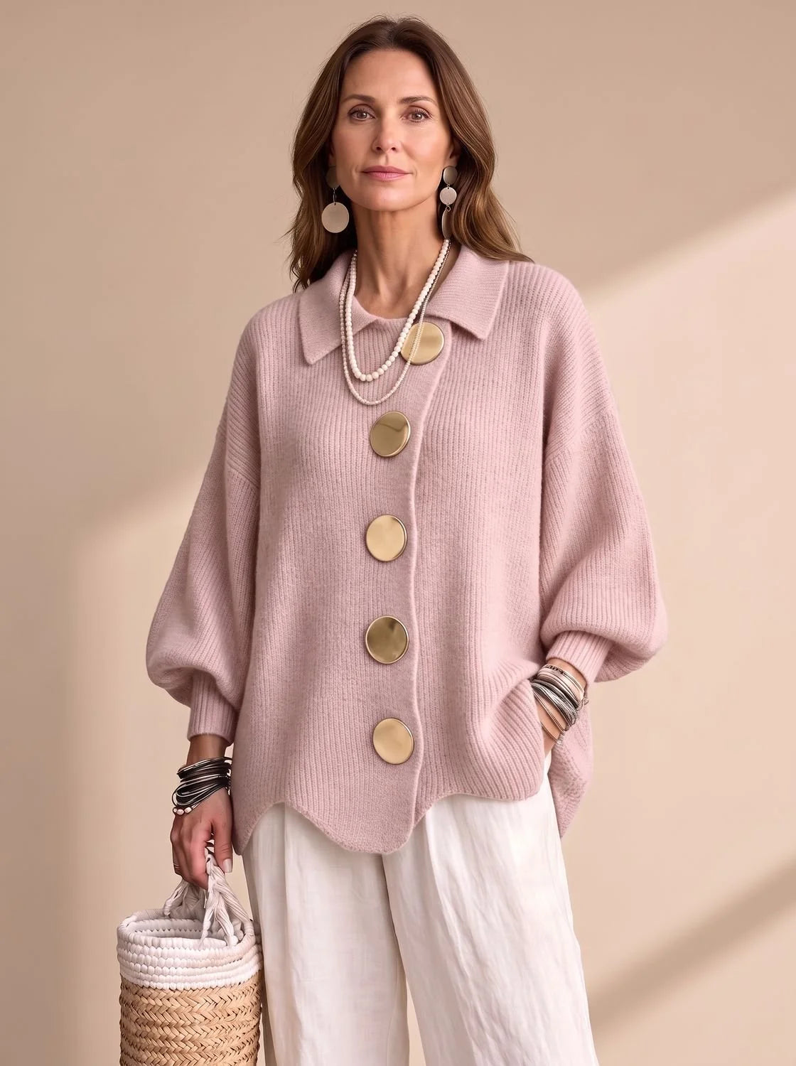 Victoria oversized knit cardigan in powder pink, front view on model