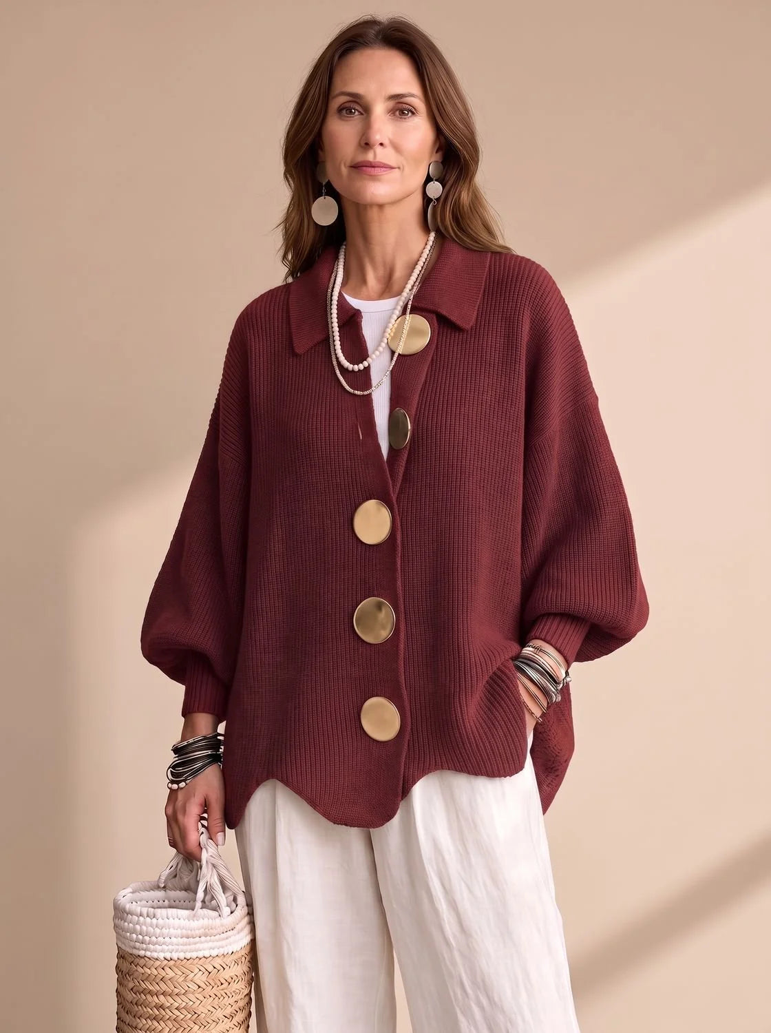 Victoria oversized knit cardigan in red, front view on model