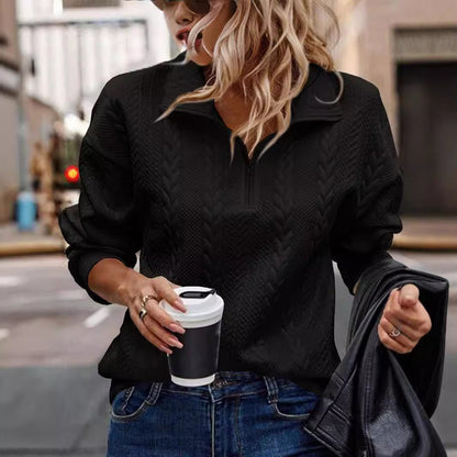 Black chevron knit half-zip sweater styled with jeans