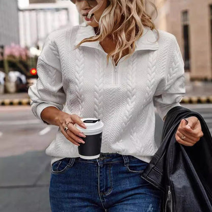 White chevron knit sweater styled with jeans