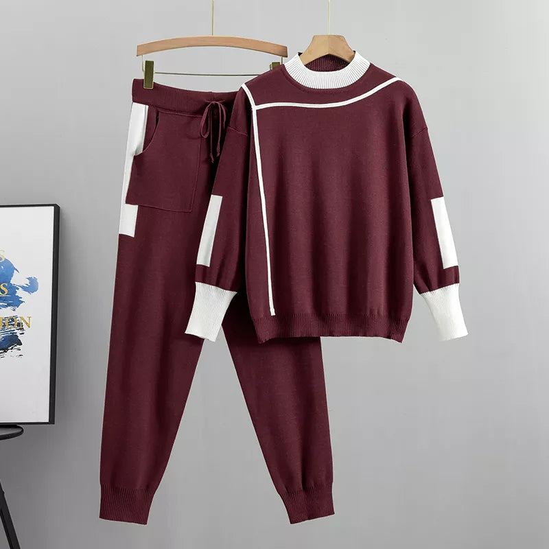 Women's burgundy colorblock knit tracksuit set on hanger