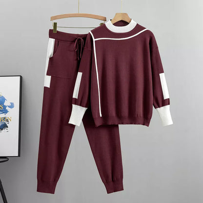 Women's burgundy colorblock knit tracksuit set on hanger