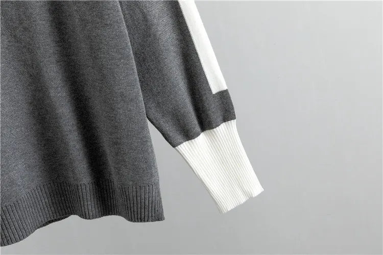 Grey knit sweater contrast sleeve panel detail