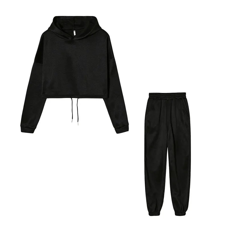 Black cropped hoodie and joggers set, flat lay