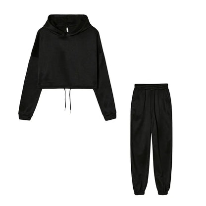 Black cropped hoodie and joggers set, flat lay