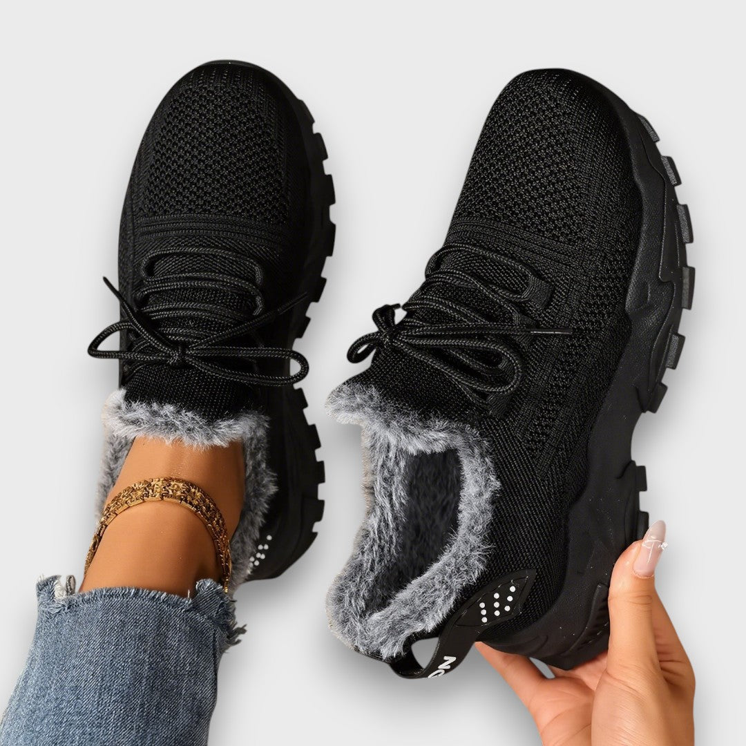 Women's black lace-up winter sneakers with faux fur lining