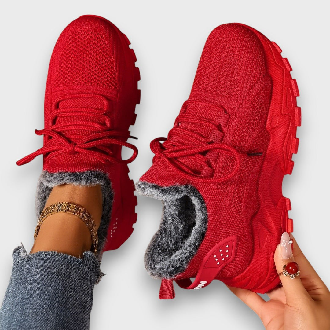 Red lace-up winter sneakers with faux fur lining
