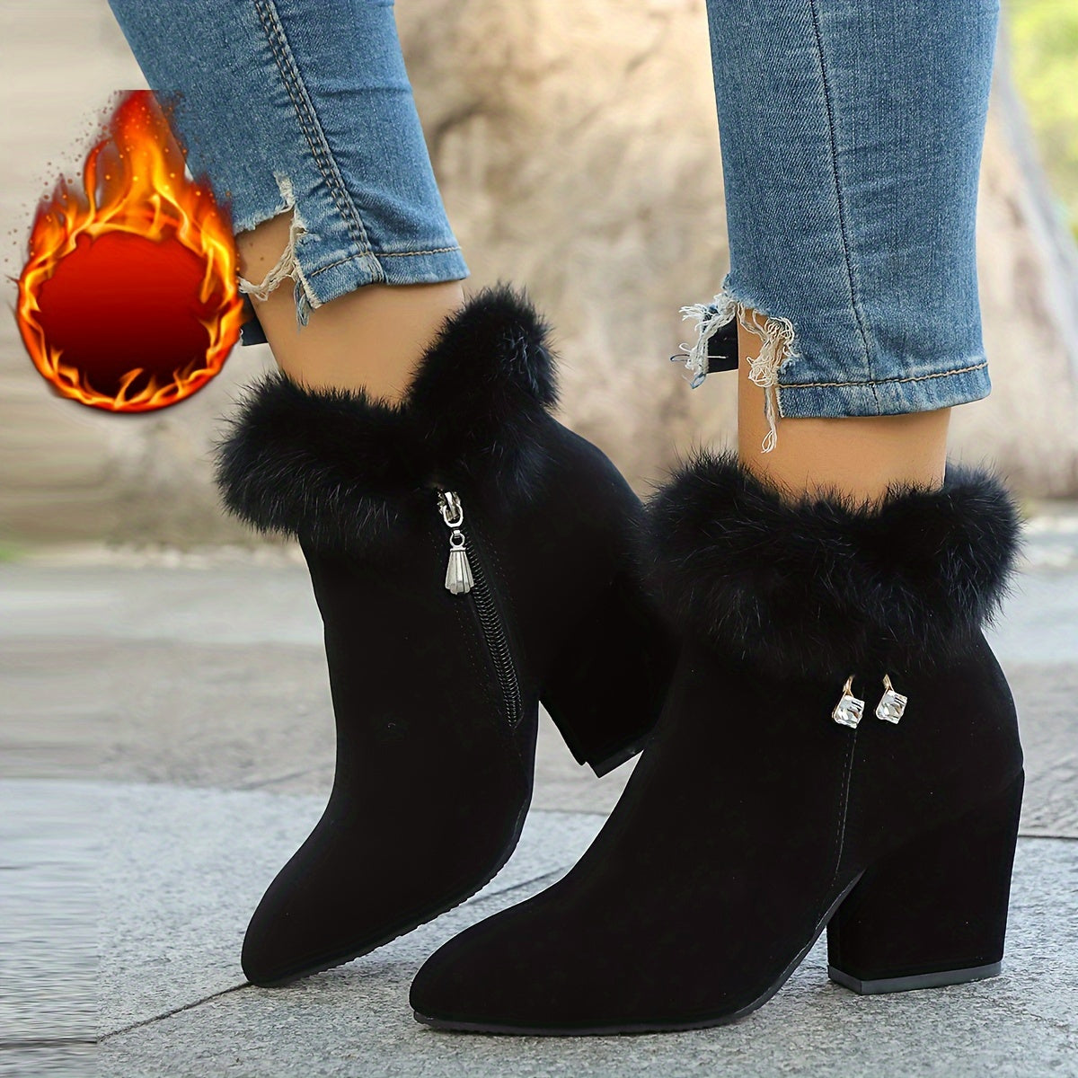 Black pointed toe ankle boots with faux fur trim, front view