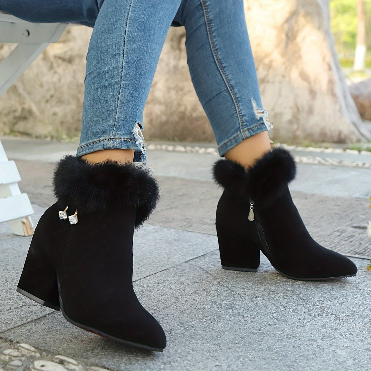 Black faux fur trim ankle boots, outdoor view