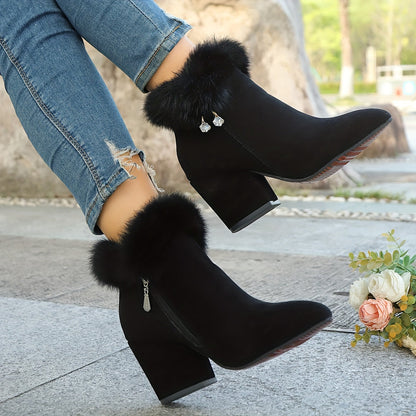 Black faux fur trim ankle boots styled with jeans