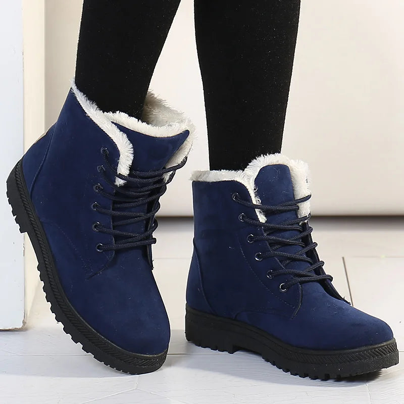 Blue fleece-lined lace-up ankle boots, worn view