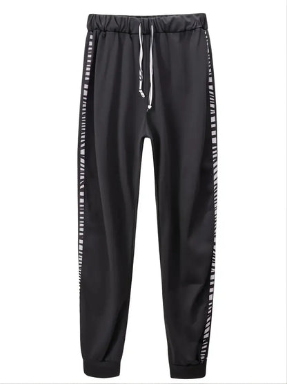 Black drawstring pants from tracksuit set, product view