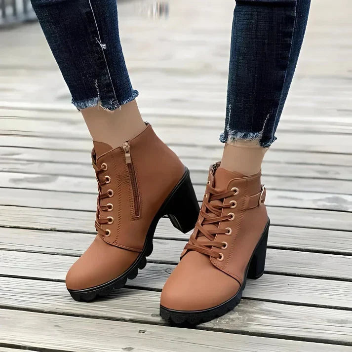 Brown lace-up ankle boots, side view