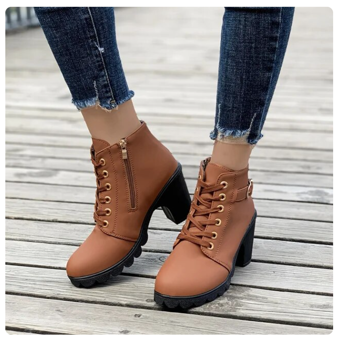 Brown lace-up ankle boots with block heel, worn view